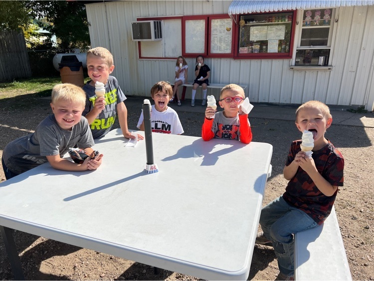 First Grade students eating ice cream