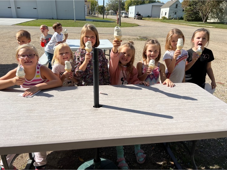 First Grade students enjoying ice cream at the Tasty Treat