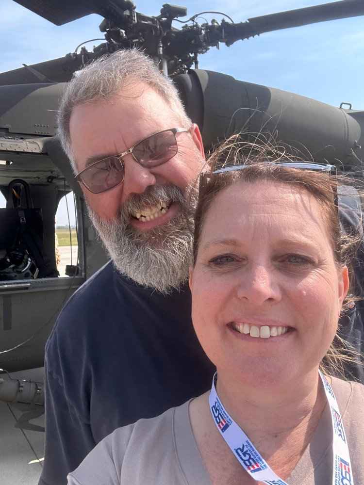 Mr and Mrs. Bowen with our Blackhawk in the background